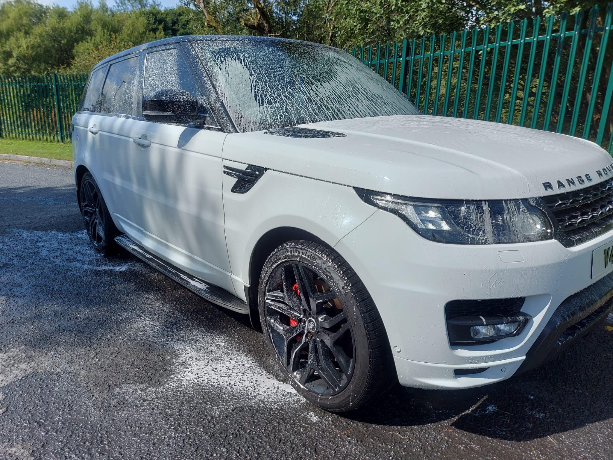 Freshly polished car exterior with deep gloss shine